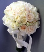 Bridal bouquet of roses and freesias